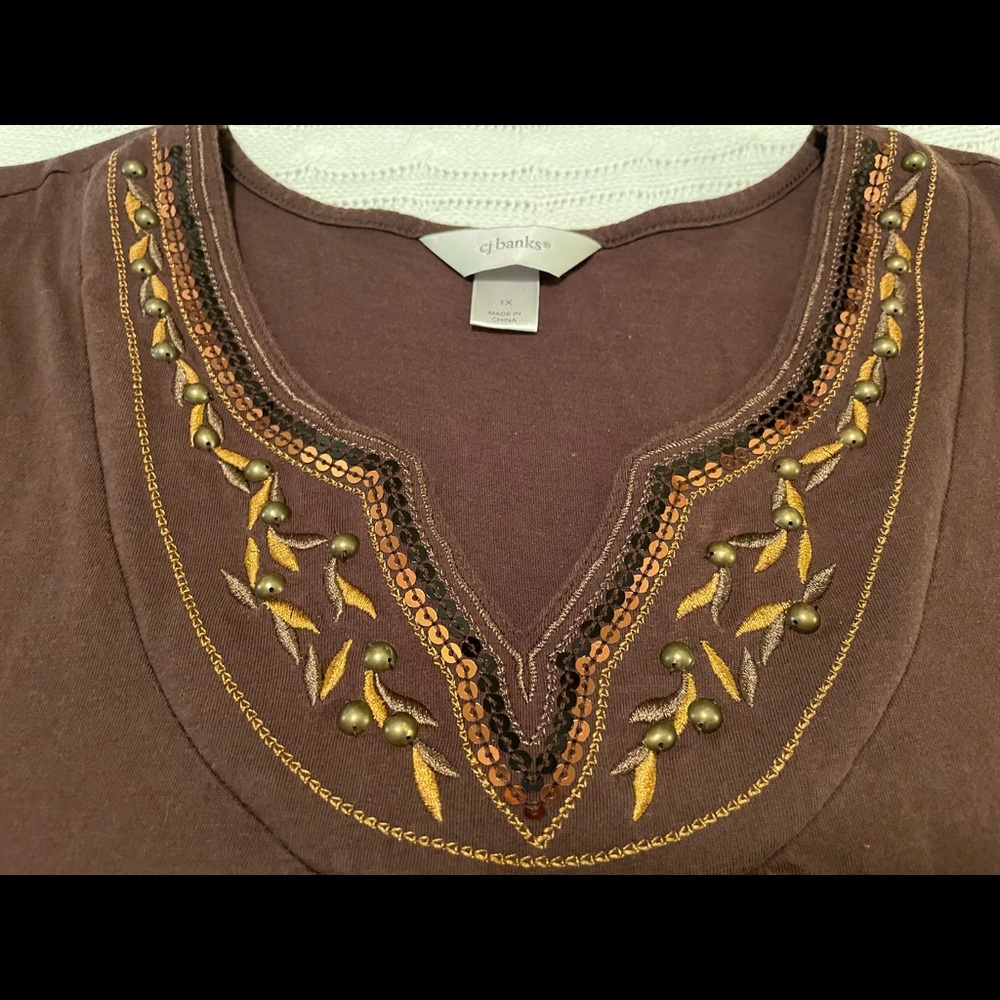 CJ Banks 1X T-Shirt, bejeweled neckline. Gently used. Color may vary.